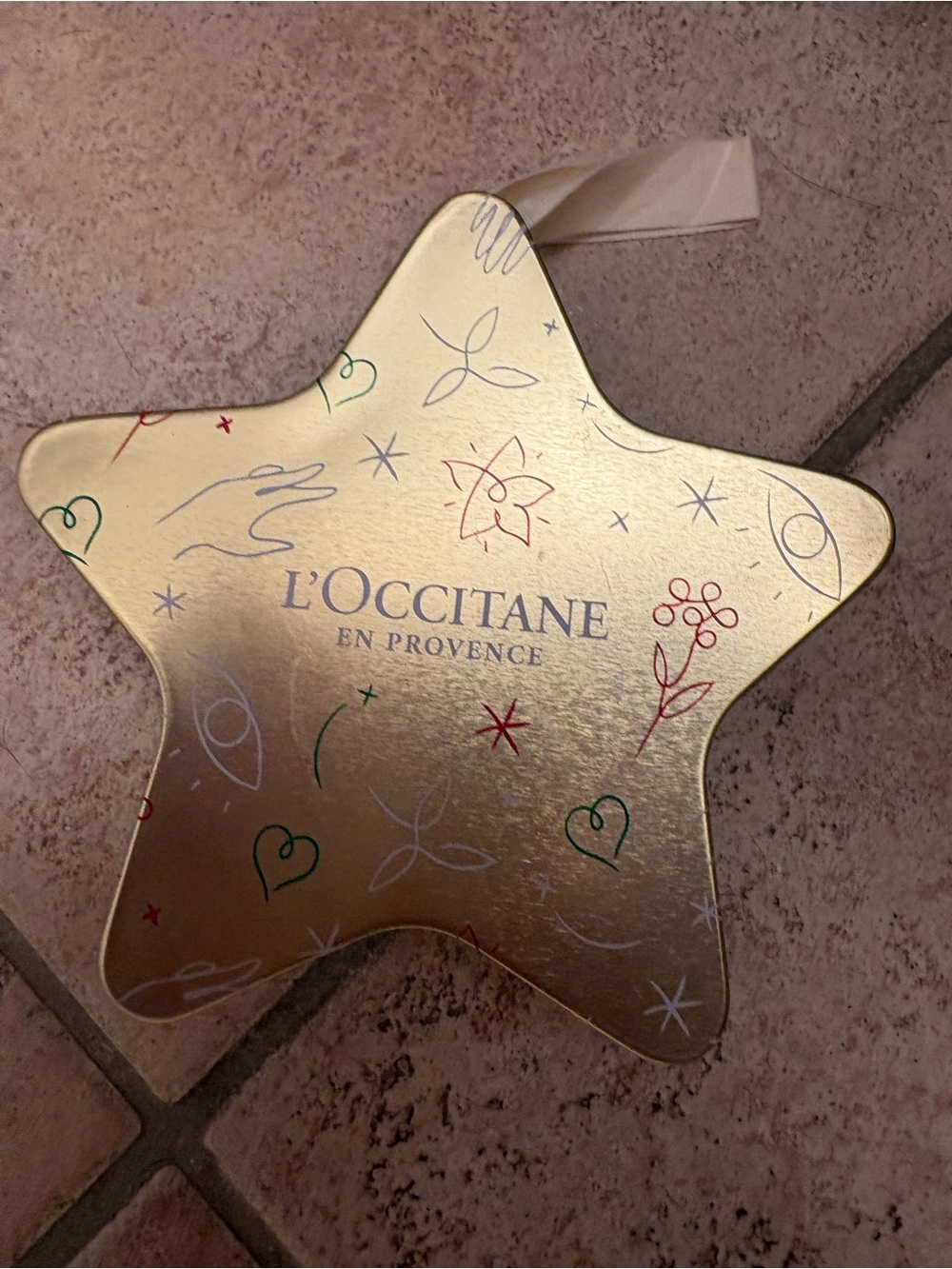 L'OCCITANE Gold Star Ornament Tin with Multicolor Accents